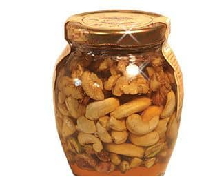 Natural mountain honey  mixed with nuts such as_ walnut_ pistachios_ peanut_ dry fig